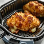 chicken cordon bleu air fryer recipe with golden crust and melted cheese