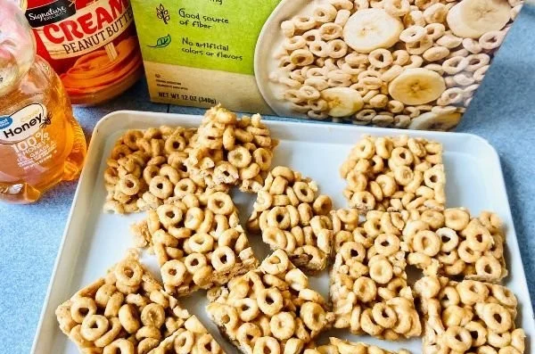 Delicious homemade Peanut Butter and Cheerio Bars on a plate