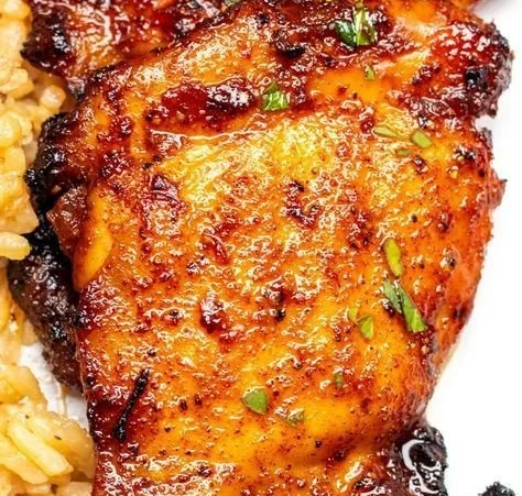 Juicy air fryer boneless skinless chicken thighs garnished and ready to serve