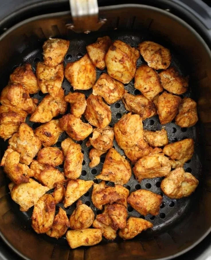 Crispy and healthy air fryer chicken bites served on a plate