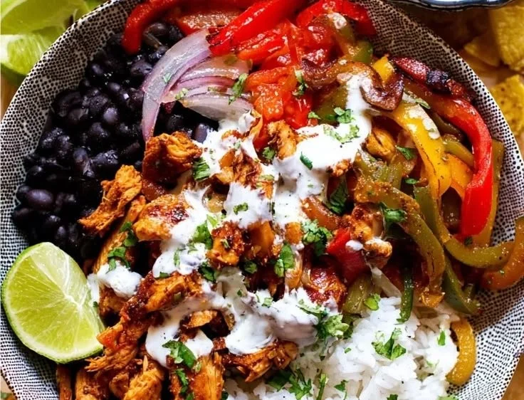 Delicious Chicken Fajita Bowl with peppers and spices served in a vibrant dish