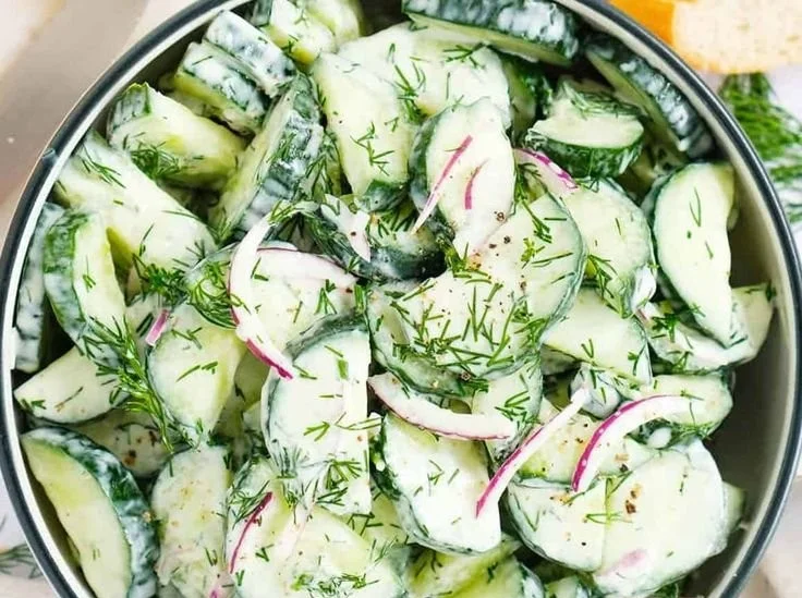 Fresh Cucumber Dill Salad with vibrant cucumbers and dill garnish.