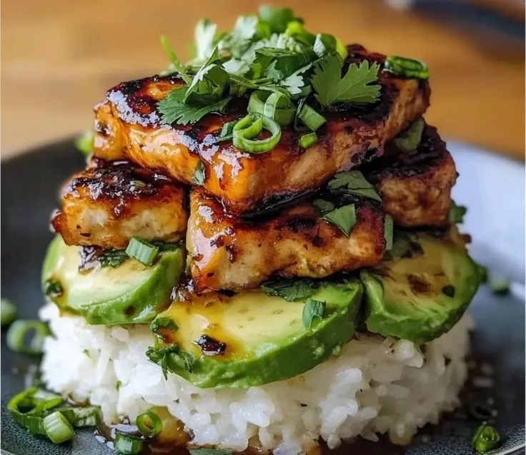 Honey Lime Chicken with Avocado Rice Stack on a plate