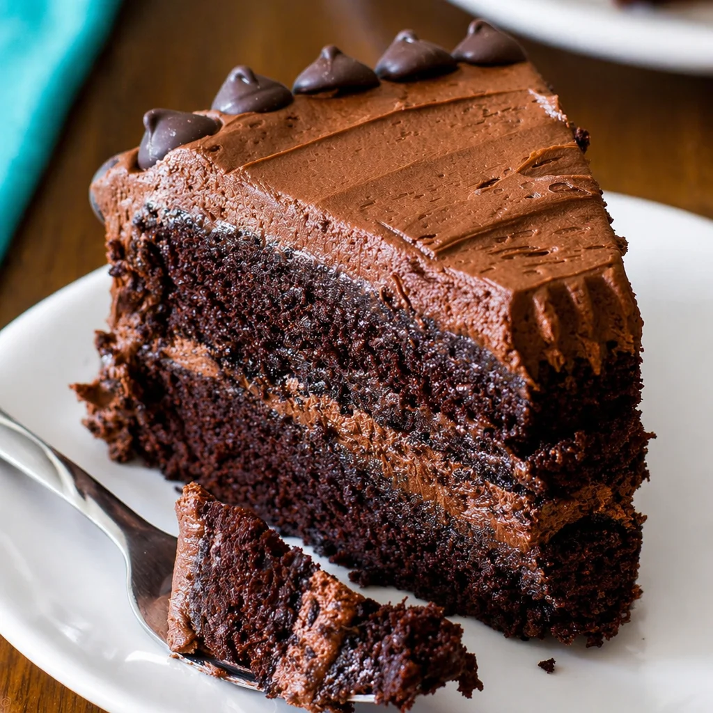 Delicious chocolate layer cake with rich chocolate buttercream frosting.