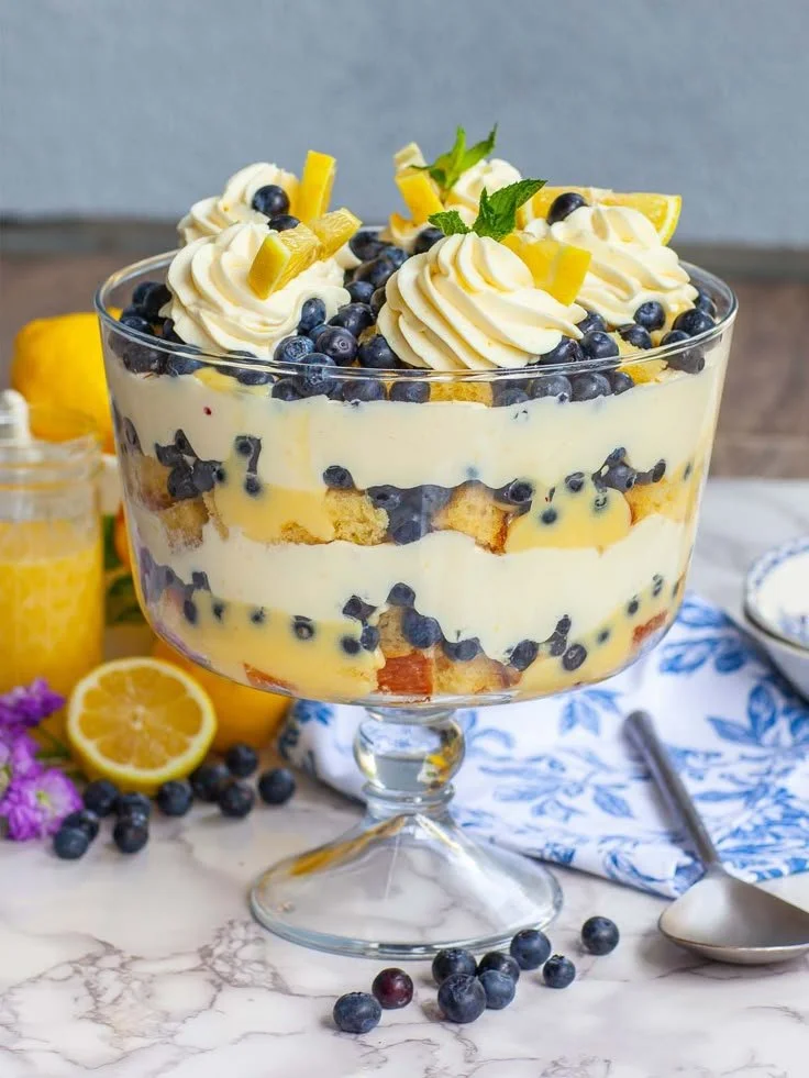 Delicious lemon blueberry trifle with layers of lemon cream and fresh blueberries