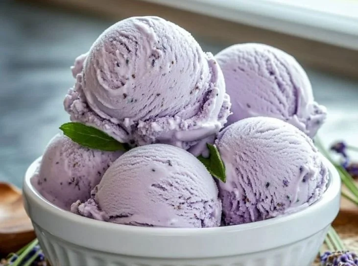 Elegant floral ice cream dessert with vibrant flowers and creamy texture.