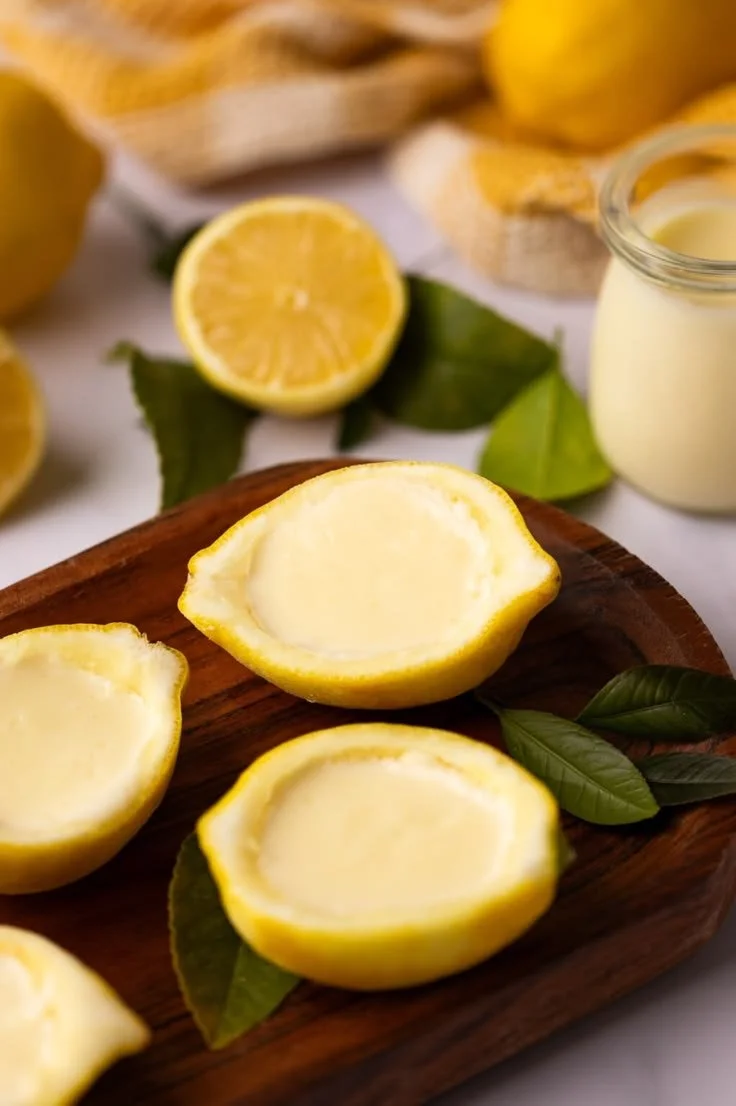 Delicious homemade Lemon Posset served in a glass with lemon zest garnish.