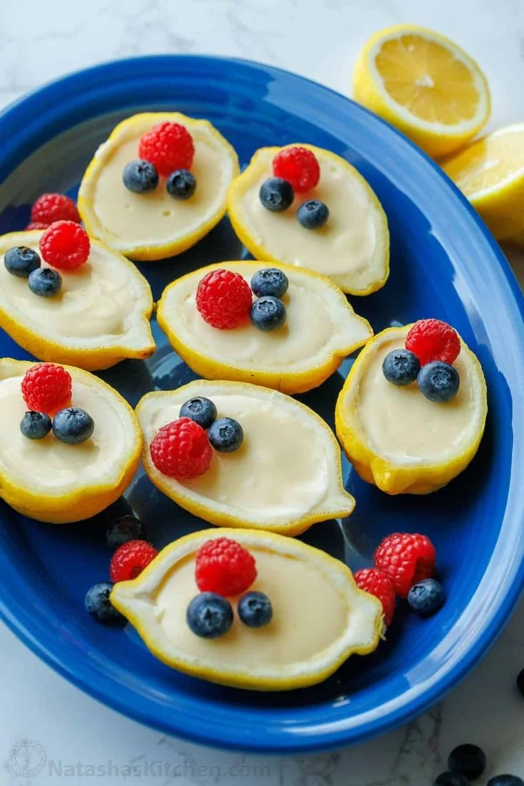 Delicious Lemon Posset dessert in a glass, garnished with lemon zest