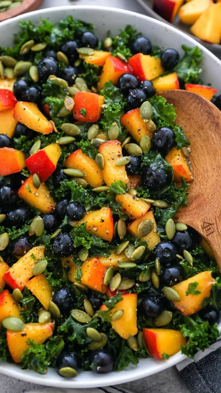 Fresh Peach Blueberry Kale Salad with vibrant colors and healthy ingredients
