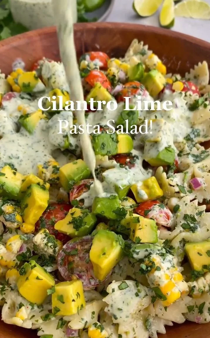 Summer pasta salad featuring colorful vegetables and cilantro-lime dressing
