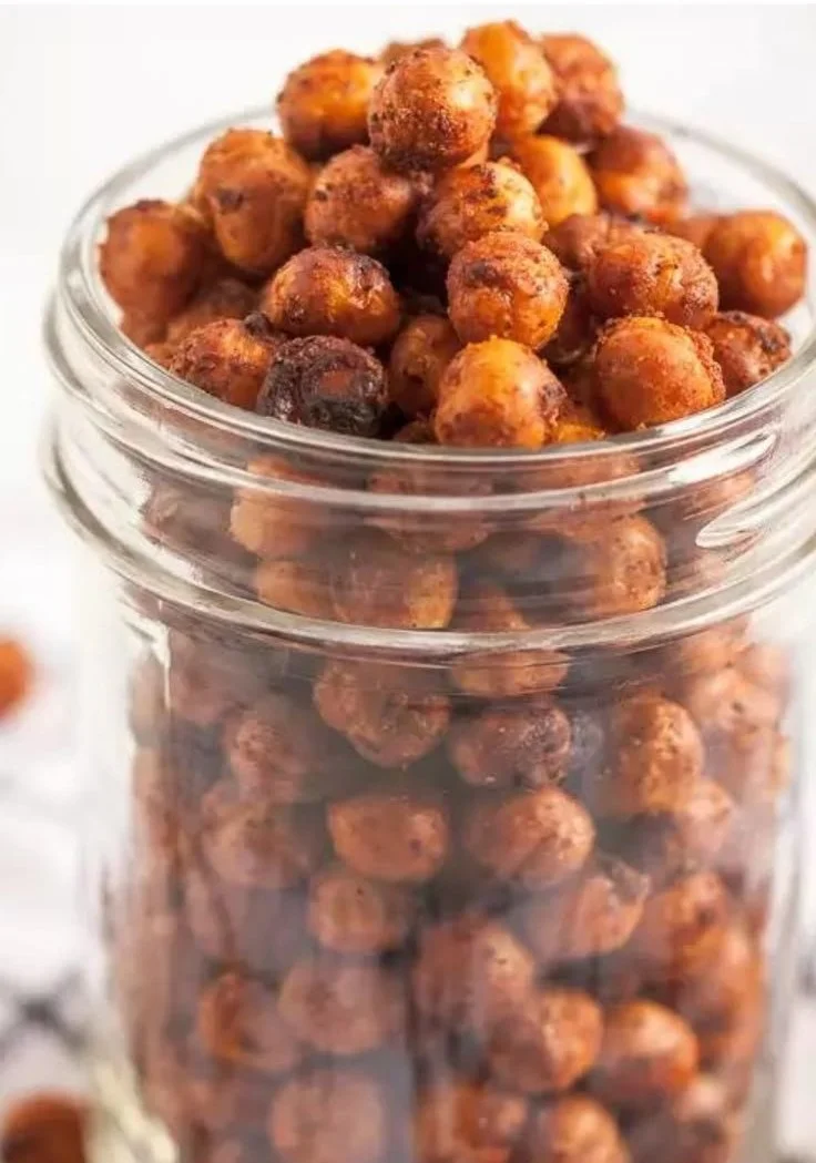 Bowl of air-fried crispy chickpeas seasoned with spices.