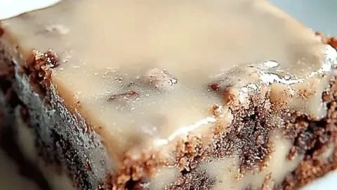 Delicious banana bread brownies served on a plate, showcasing their rich texture.