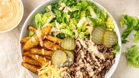 Delicious Burger Bowls with juicy patties, fresh vegetables, and dressings