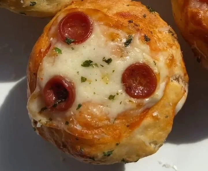 Delicious cheesy biscuit pizzas topped with fresh ingredients