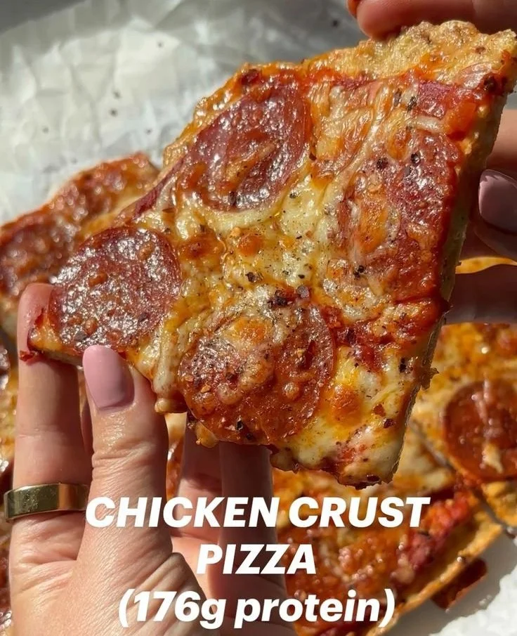 Homemade Chicken Crust Pizza topped with fresh ingredients and melted cheese