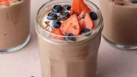 Delicious chocolate protein pudding served in a bowl with a spoon