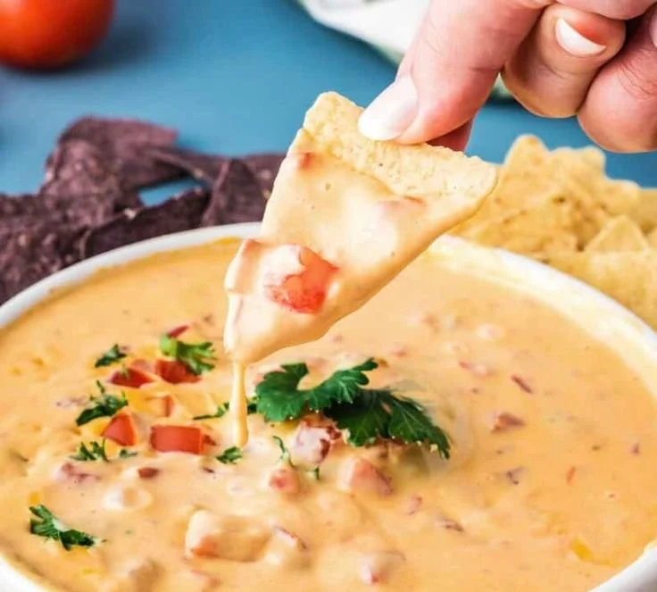 Creamy Velveeta Rotel Dip served in a bowl with tortilla chips