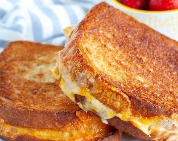 A delicious air fryer grilled cheese sandwich with golden-brown crust.