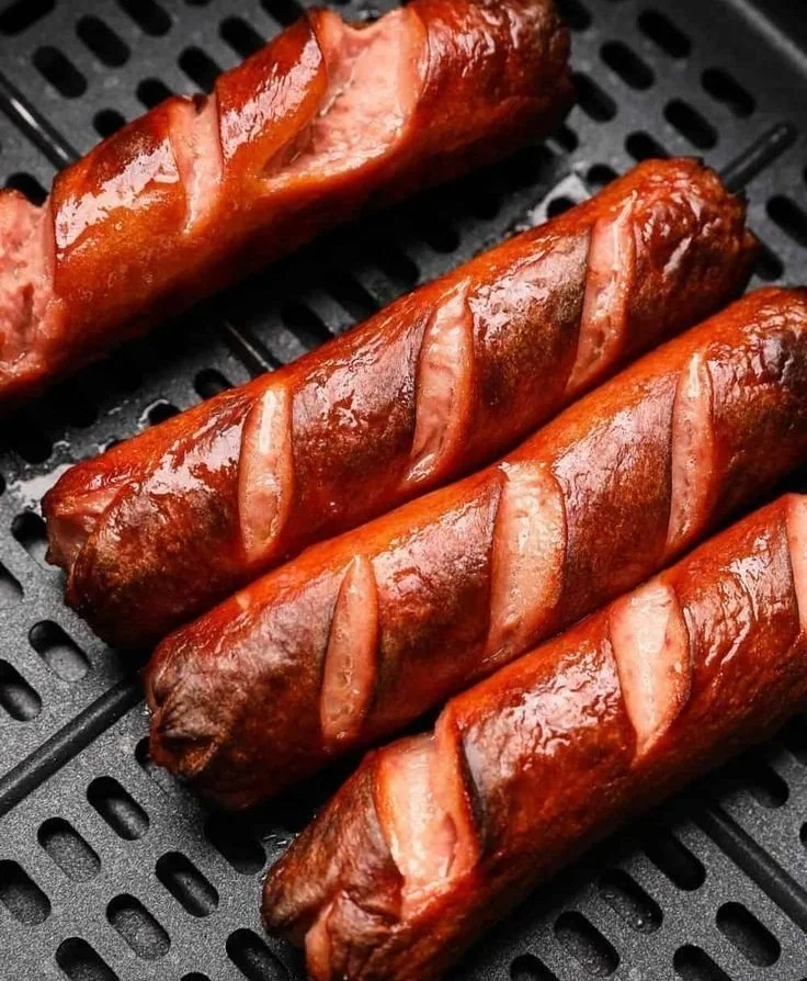 Deliciously cooked air fryer hot dogs ready to serve.