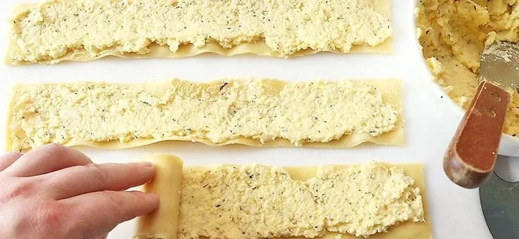 Delicious Air Fryer Lasagna Fritta served on a plate with fresh herbs