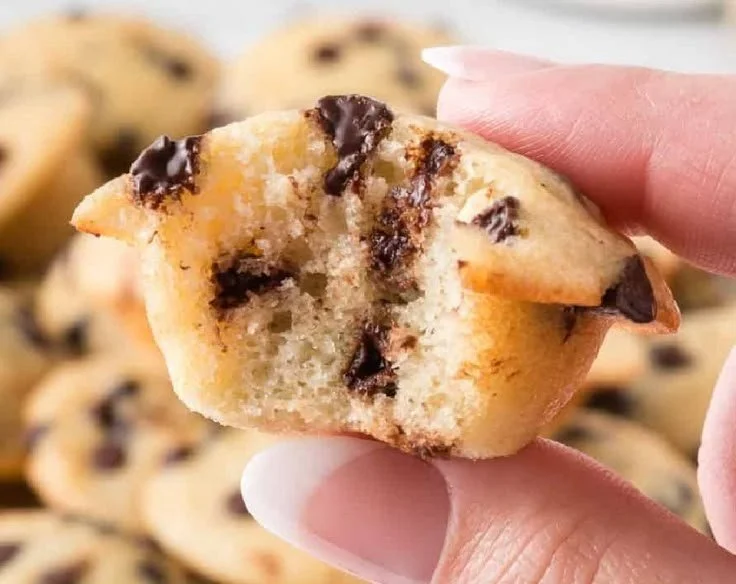 Batch of easy mini chocolate chip muffins fresh from the oven