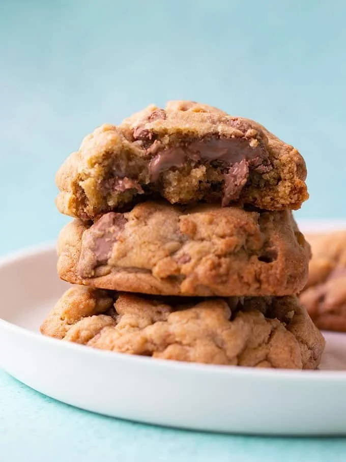 Freshly baked Levain Chocolate Chip Cookies on a cooling rack