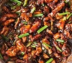 Plate of Minute Mongolian Chicken with vibrant vegetables and sauce