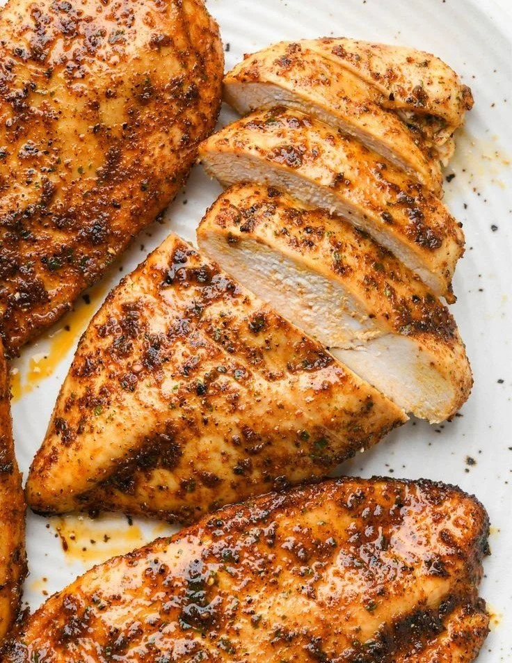 Oven-baked juicy chicken breasts ready to serve for dinner