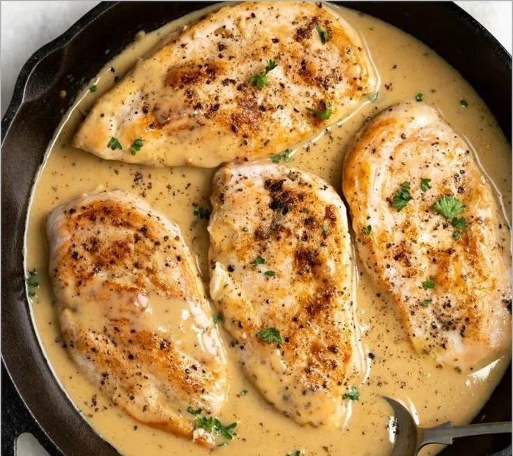 Delicious Ranch Chicken with creamy ranch dressing served on a plate.