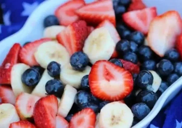 Colorful Red White Blue Fruit Salad featuring strawberries, blueberries, and bananas