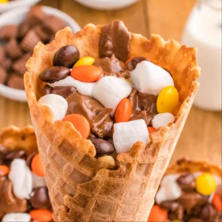Delicious Reese's Campfire Cone Treats ready for roasting over a campfire