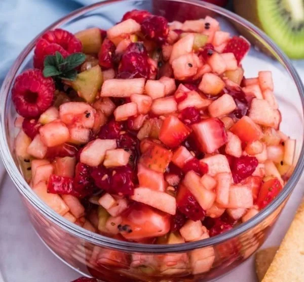 Sweet fruit salsa served with crispy cinnamon sugar tortilla chips.