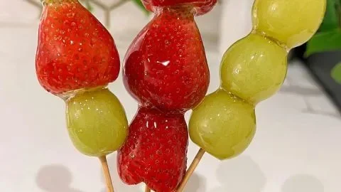 Delicious tanghulu - candied Chinese fruit on skewers