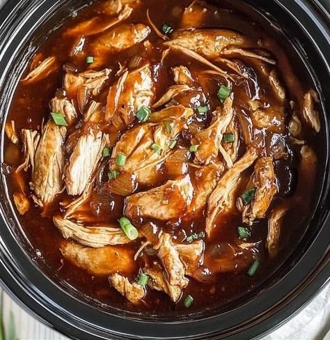 Delicious Bourbon Chicken with a rich bourbon glaze served on a plate