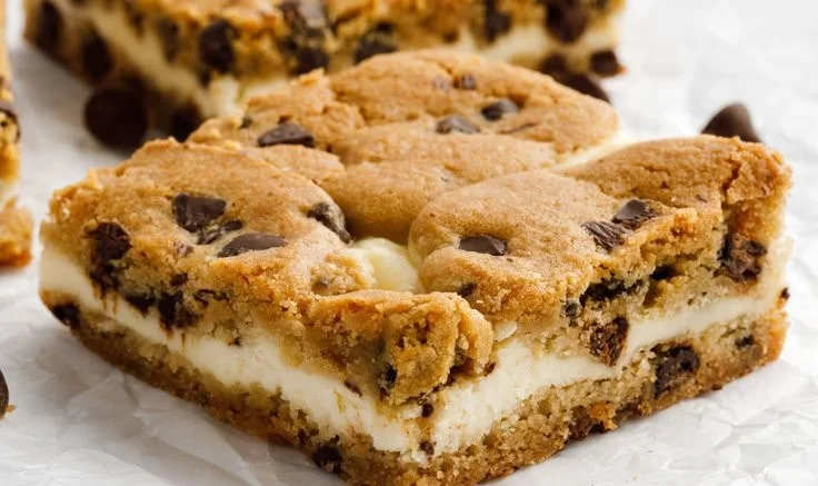 Classic Chocolate Chip Cheesecake Bars with a rich, creamy filling and chocolate chips