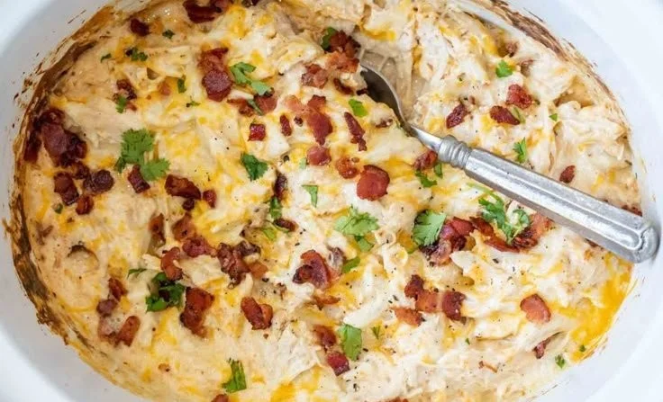 Delicious Crack Chicken served in a bowl, showcasing its creamy texture and enticing flavors.