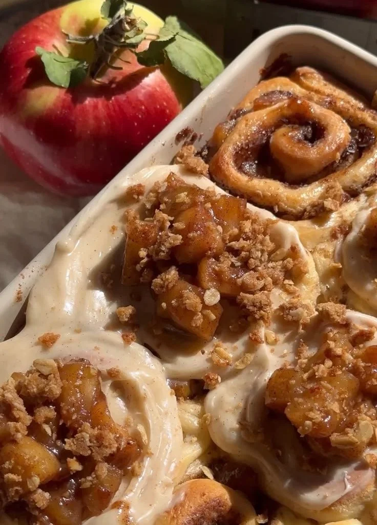 Flaky apple pie cinnamon rolls with cinnamon glaze and apple filling
