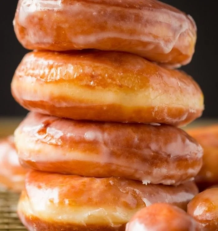 Delicious homemade glazed donuts on a plate
