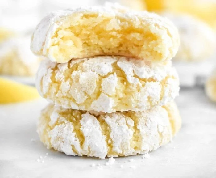 Lemon zest crinkle cookies with a light dusting of powdered sugar