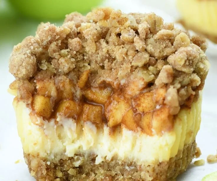Mini apple crisp cheesecake bites with apple topping and crumble crust