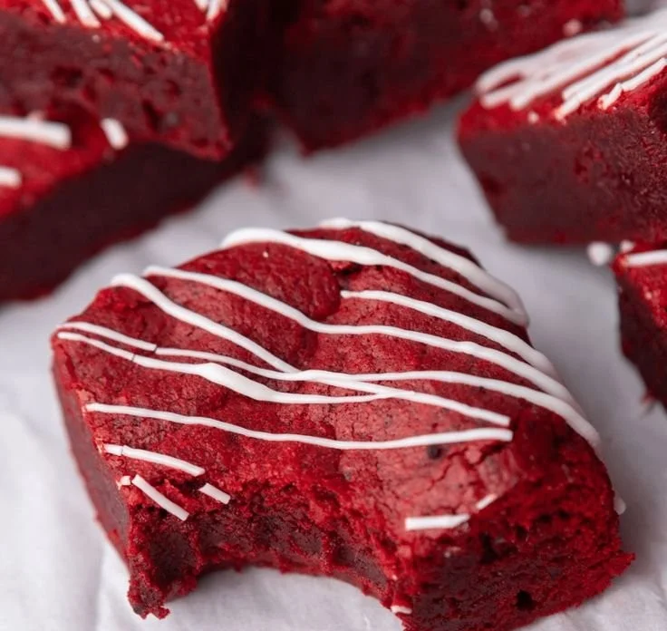 Delicious red velvet cheesecake brownies served on a plate