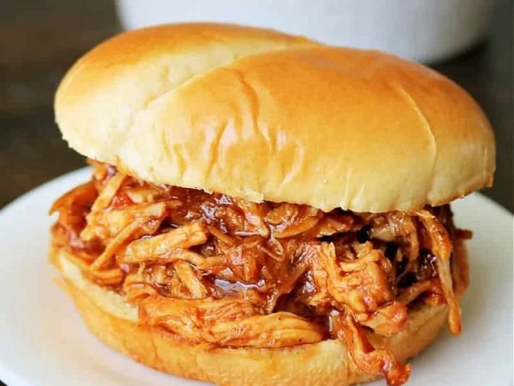 Delicious crockpot BBQ chicken served on a plate