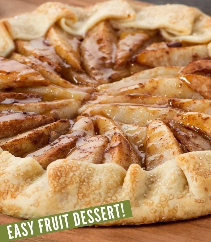 Warm Caramel Pear Galette topped with caramel sauce and pears