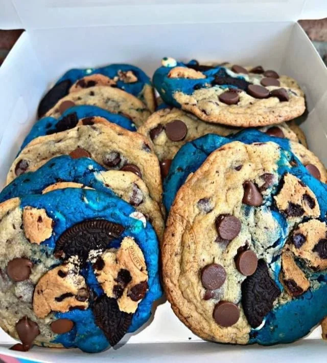 Plate of colorful Monster Cookies inspired by Cookie Monster.