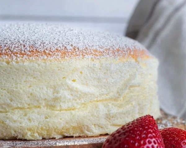 Fluffy Japanese cheesecake on a plate, showcasing its light and airy texture.